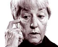 picture of Jane Elliott with her finger to her face as if she is considering a question